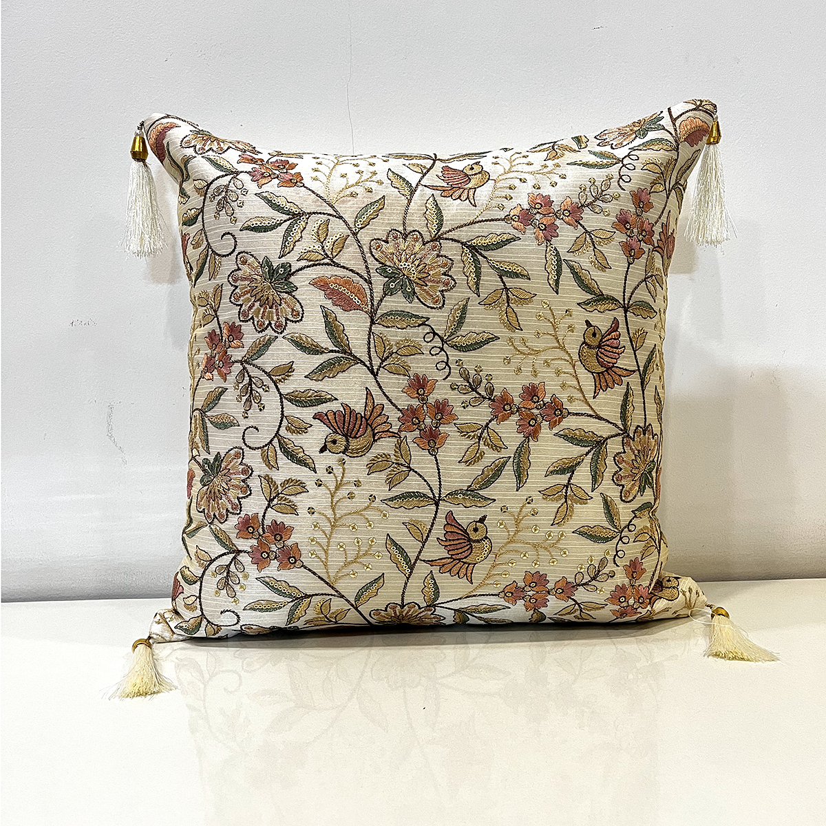 Embroidered Zara cushion cover in bird flowers, front view