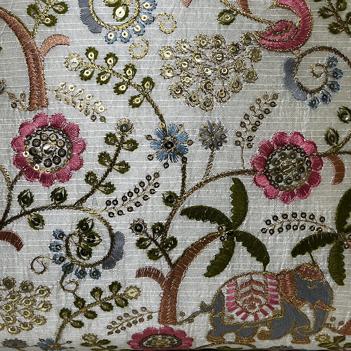 Close-up of the elephant and palm embroidery