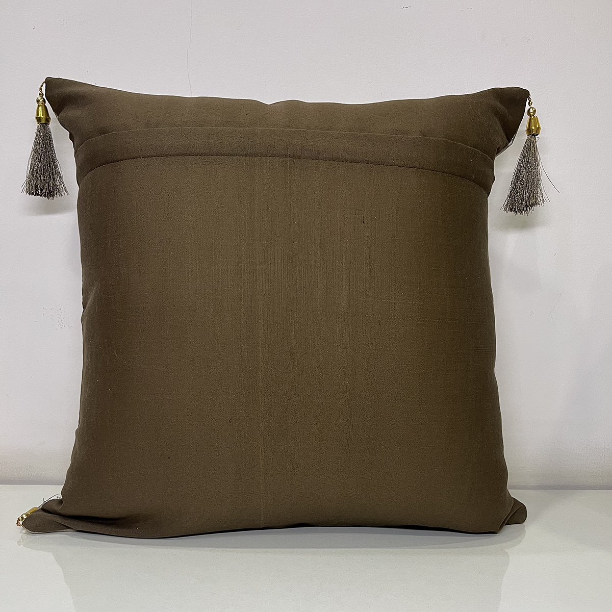 French Tussle cushion cover in brown, back view