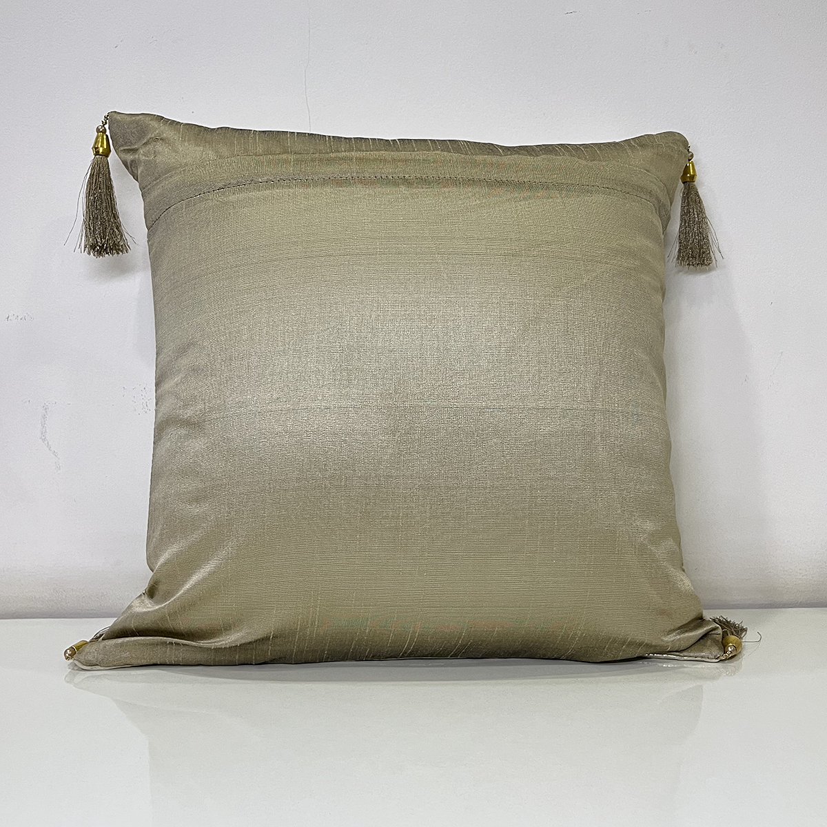 French Tussle cushion cover in champagne gold, back view