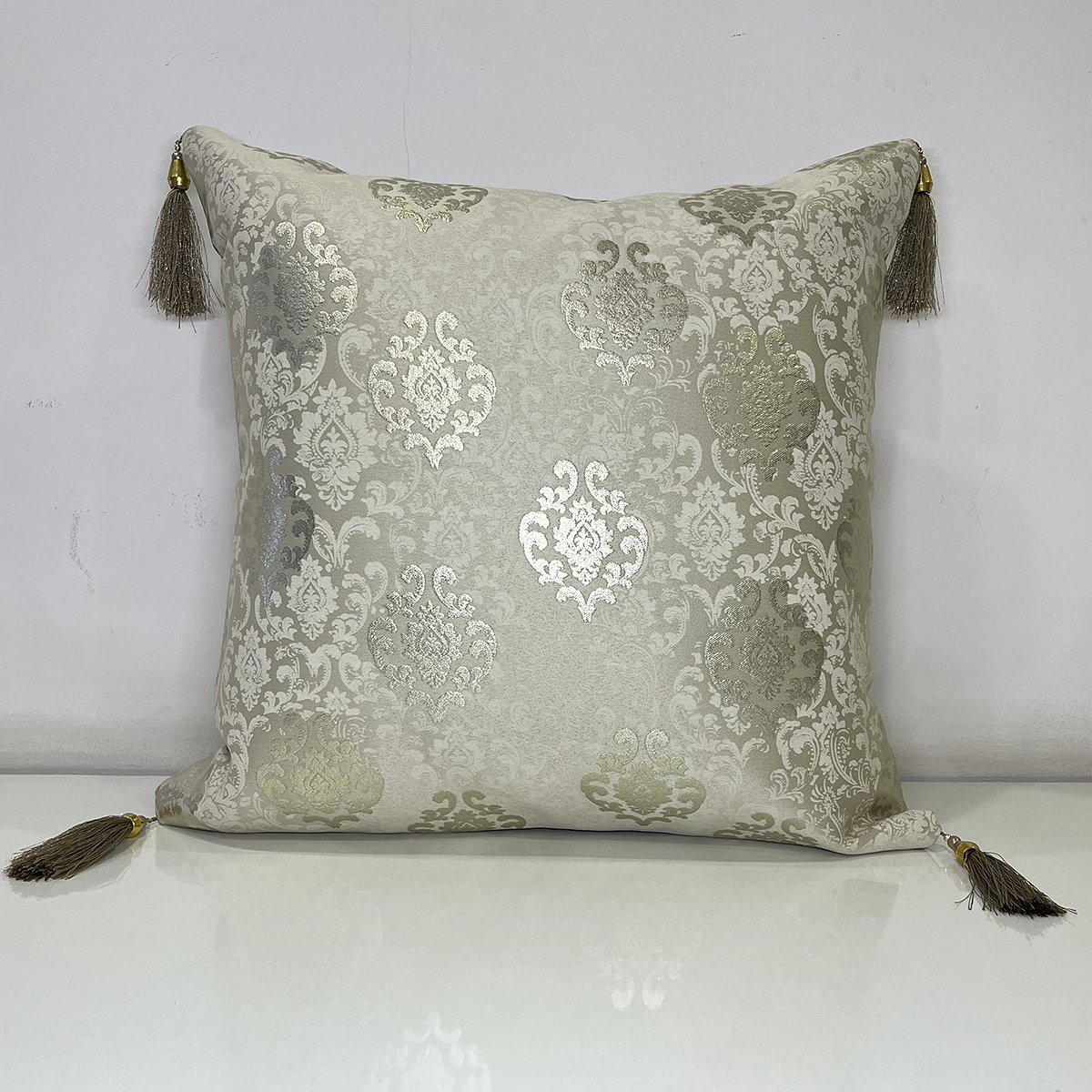 French Tussle cushion cover in champagne gold, front view