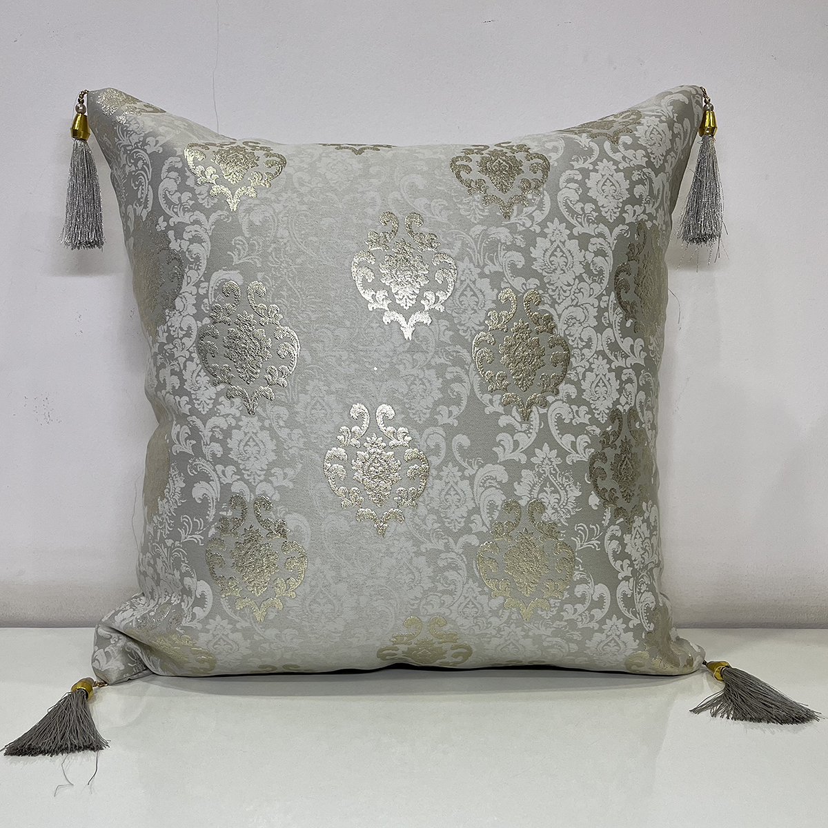 French Tussle cushion cover in light grey, front view